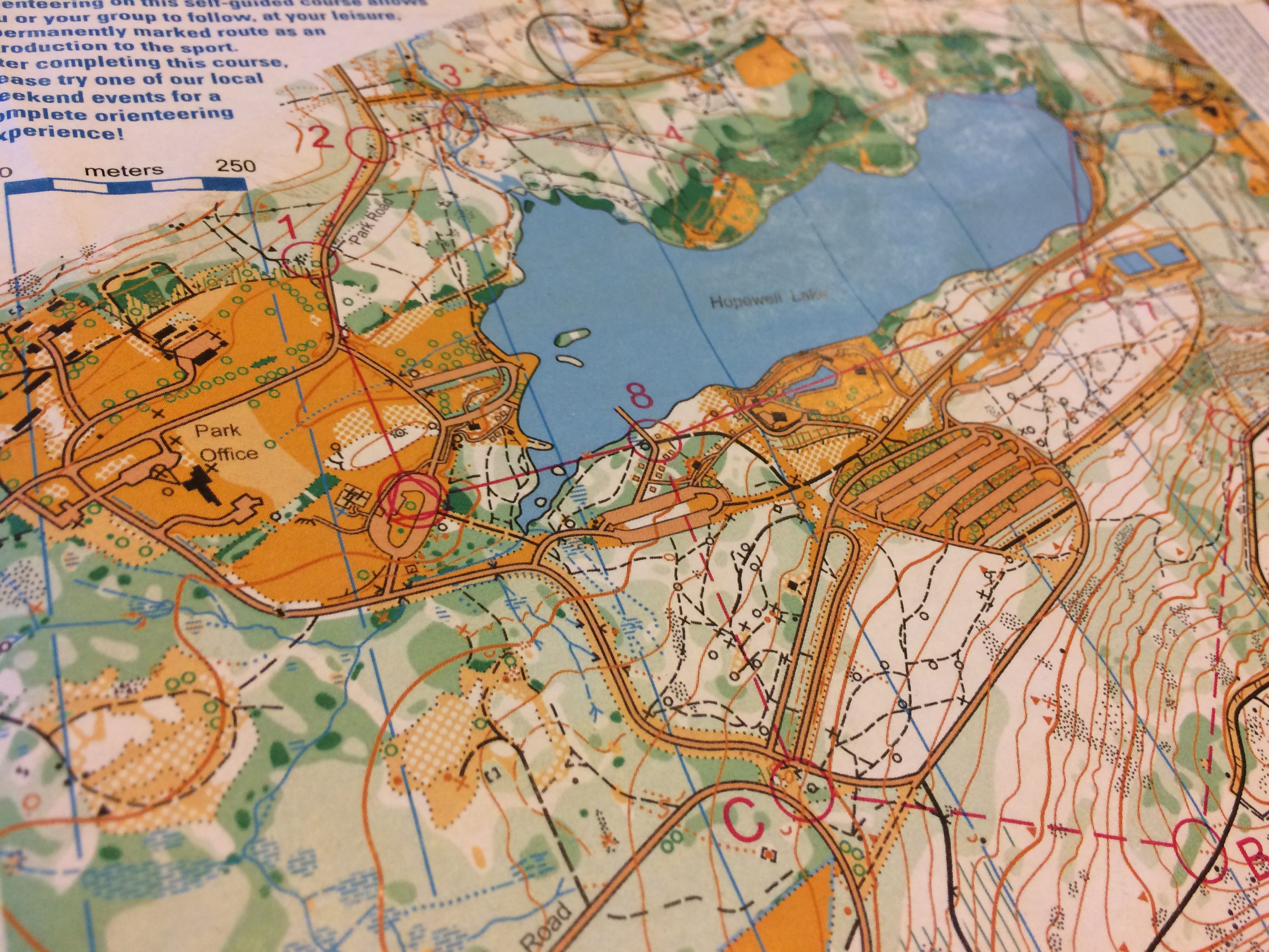 he red lines and control numbers designate the orienteering course. Photo by Carrie Scheick
